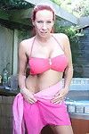 Big breasted british milf playing in the hottub
