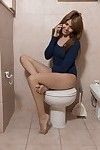 Olivia poses naked by toilet with a surprise