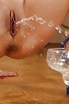 Latina MILF Francys Belle pissing into glass wearing high heels