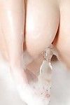 Teen beauty Ashlyn baring shaved pussy and tiny breasts in soapy shower