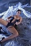 Busty Latina pornstar lets her big juggs loose from wet bathing suit