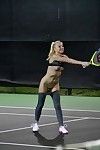 Athletic blonde babe strips down outside and stretches her tight pussy