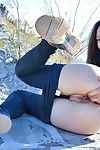 Flexible fitness girl in yoga pants spreading ass & fisting pussy outdoors
