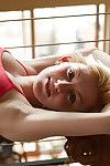Luscious blonde teen Wynee Leonard getting naked on her bedroom floor