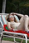 Tempting cutie in sunglasses Madison Chandler slipping off her bikini