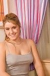 Big tit blonde whore teen Belle undressing her cute body