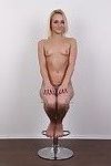 Petite blonde model poses naked