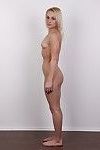 Petite blonde model poses naked