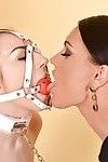 BDSM mistress Honey Demon slaps and squeezes ass of Stacy Snake