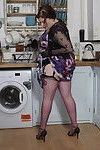 Chubby british housewife playing in her kitchen