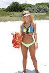 Amateur beach bunny Chanel Collins showing of phat thong covered bottom