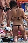 Nice mix of nude candid pictures taken on the beach
