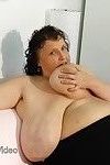 Mature plumper anika sucking her own gigantic breasts