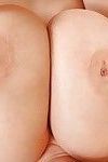 Big tits pornstar Lucie Wilde shows off her pornstar ass in high heels