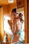 Long legged brunette centerfold model Ana Cheri exposes big breasts in kitchen