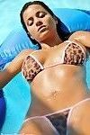 Busty brazilian babe fingering pussy in bikini