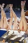 Three chicks in bikinis stripping