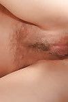 Close up of amateur cutie Loredana taking cumshot on hairy vagina