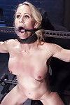 Blonde MILF Simone Sonay gets her bare ass whipped in restraints