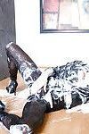 Lusty fetish chick has some messy fully clothed fun with a fake cock and jizz