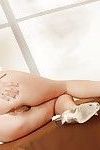 Solo girl Allie Haze baring perky tits during cosplay pornstar photo shoot