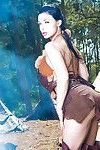 Brunette babe Aletta Ocean striking naughty poses outdoors in cosplay getup