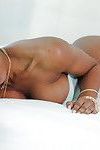 Gorgeous ebony babe model Nadia Jay striking sexy poses in white underwear