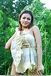 European glamour model Sofi A revealing perfect breasts in country field