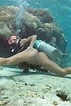Raunchy blonde slut Nikky spreads her orgasmic pussy underwater