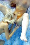 Petite teenage chicks have some lesbian fun using their toys in the pool