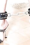 Kinky European woman Lady Sarah posing in nippleless bra and handcuffs