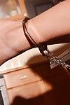Handcuffed and chained Chelsey Lanette having huge dildo inserted into anus