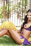 Latina cheerleader Sadie Santana giving a glimpse of her pussy in backyard