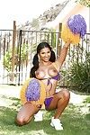 Latina cheerleader Sadie Santana giving a glimpse of her pussy in backyard