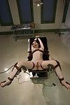 Brunette is strapon fucked by nurse in medical play scene