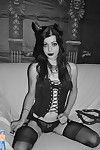 Sexy young halloween devil girl in stockings
