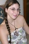 Amateur brunette freckled face teen wearing glasses