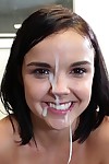 Cute brunette finishes off a hard fuck with cum on her smiley face