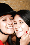 Hot lesbians Lucy Lee & Angelica playing with a dildo in the horse barn