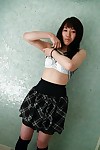 asian teen Kasumi Minasawa undressing and spreading her lower lips in close up