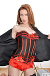 Sexy redhead Camila seduces her sleeping man in a corset and ruffled panties