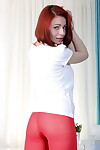 Clothed redhead Viktoriya Shanviya finishes stripping with yoga pants removal