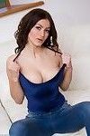 Busty brunette beauty in her tight jeans and blue top