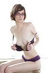 Cute teen in glasses Jay Taylor getting naked and spreading her slippy legs