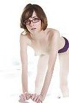 Cute teen in glasses Jay Taylor getting naked and spreading her slippy legs