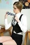 Skinny blonde bookworm in glasses getting nude in the classroom
