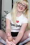 Blonde bimbo giving a two handed jerking treatment
