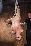 Roxanne finds herself in a brutal inverted suspension with her legs held open by