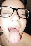 Alluring amateur in glasses pleases a hard dick with her lips and fucks it