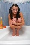 Cute lil teen girl fucks her shampoo bottle